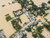 An aerial view of a flooded village in the Bishumier Hat area of Mirsarai Upazila, Chittagong Division, Bangladesh, on August 24, 2024. At l...