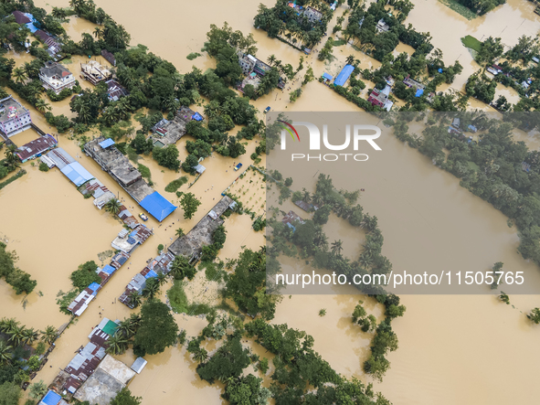 An aerial view of a flooded village in the Bishumier Hat area of Mirsarai Upazila, Chittagong Division, Bangladesh, on August 24, 2024. At l...