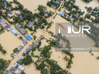 An aerial view of a flooded village in the Bishumier Hat area of Mirsarai Upazila, Chittagong Division, Bangladesh, on August 24, 2024. At l...