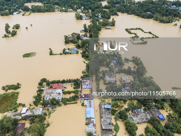 An aerial view of a flooded village in the Bishumier Hat area of Mirsarai Upazila, Chittagong Division, Bangladesh, on August 24, 2024. At l...