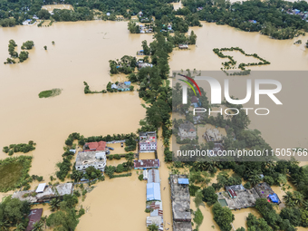 An aerial view of a flooded village in the Bishumier Hat area of Mirsarai Upazila, Chittagong Division, Bangladesh, on August 24, 2024. At l...