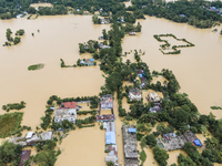 An aerial view of a flooded village in the Bishumier Hat area of Mirsarai Upazila, Chittagong Division, Bangladesh, on August 24, 2024. At l...