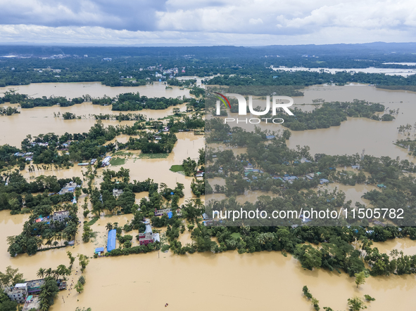 An aerial view of a flooded village in the Bishumier Hat area of Mirsarai Upazila, Chittagong Division, Bangladesh, on August 24, 2024. At l...