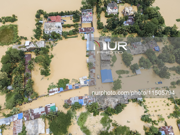 An aerial view of a flooded village in the Bishumier Hat area of Mirsarai Upazila, Chittagong Division, Bangladesh, on August 24, 2024. At l...