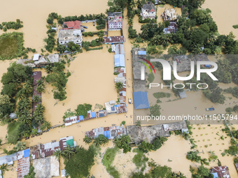 An aerial view of a flooded village in the Bishumier Hat area of Mirsarai Upazila, Chittagong Division, Bangladesh, on August 24, 2024. At l...