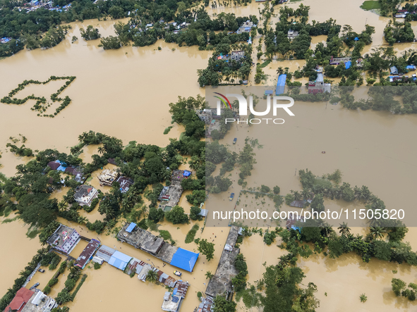 An aerial view of a flooded village in the Bishumier Hat area of Mirsarai Upazila, Chittagong Division, Bangladesh, on August 24, 2024. At l...