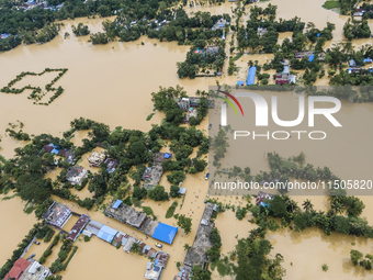 An aerial view of a flooded village in the Bishumier Hat area of Mirsarai Upazila, Chittagong Division, Bangladesh, on August 24, 2024. At l...