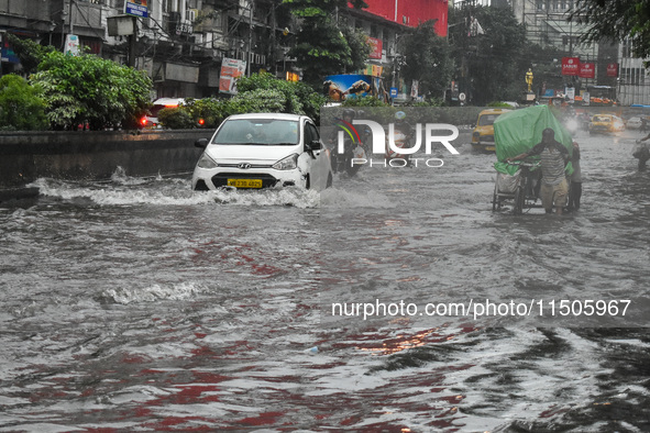 Massive waterlogging is seen in various parts of Kolkata, India, on August 24, 2024, amidst heavy torrential rain in Kolkata, India. 