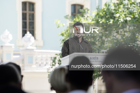 Ukrainian President Volodymyr Zelenskiy speaks during a joint press conference with Polish President Andrzej Duda and Lithuanian Prime Minis...