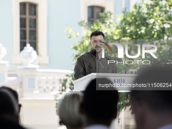 Ukrainian President Volodymyr Zelenskiy speaks during a joint press conference with Polish President Andrzej Duda and Lithuanian Prime Minis...