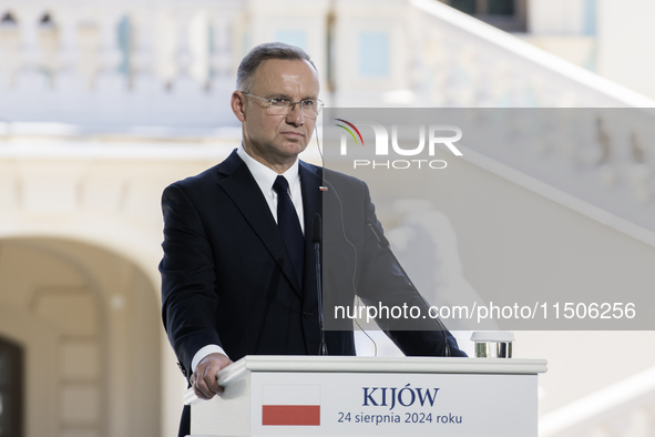 Polish President Andrzej Duda speaks during a joint press conference with Ukrainian President Volodymyr Zelenskiy and Lithuanian Prime Minis...