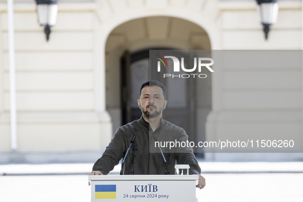 Ukrainian President Volodymyr Zelenskiy speaks during a joint press conference with Polish President Andrzej Duda and Lithuanian Prime Minis...