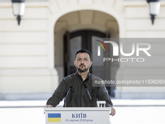 Ukrainian President Volodymyr Zelenskiy speaks during a joint press conference with Polish President Andrzej Duda and Lithuanian Prime Minis...