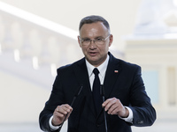 Polish President Andrzej Duda speaks during a joint press conference with Ukrainian President Volodymyr Zelenskiy and Lithuanian Prime Minis...