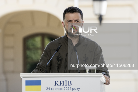 Ukrainian President Volodymyr Zelenskiy speaks during a joint press conference with Polish President Andrzej Duda and Lithuanian Prime Minis...