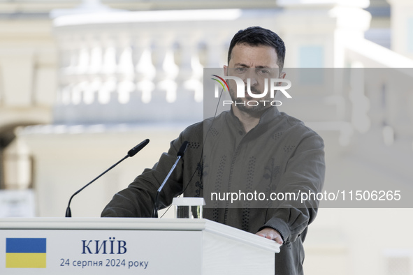 Ukrainian President Volodymyr Zelenskiy speaks during a joint press conference with Polish President Andrzej Duda and Lithuanian Prime Minis...