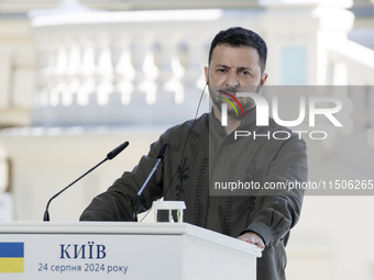 Ukrainian President Volodymyr Zelenskiy speaks during a joint press conference with Polish President Andrzej Duda and Lithuanian Prime Minis...