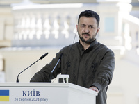 Ukrainian President Volodymyr Zelenskiy speaks during a joint press conference with Polish President Andrzej Duda and Lithuanian Prime Minis...