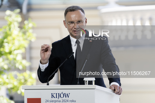 Polish President Andrzej Duda speaks during a joint press conference with Ukrainian President Volodymyr Zelenskiy and Lithuanian Prime Minis...