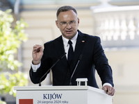 Polish President Andrzej Duda speaks during a joint press conference with Ukrainian President Volodymyr Zelenskiy and Lithuanian Prime Minis...