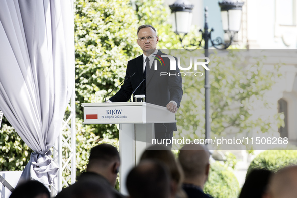 Polish President Andrzej Duda speaks during a joint press conference with Ukrainian President Volodymyr Zelenskiy and Lithuanian Prime Minis...