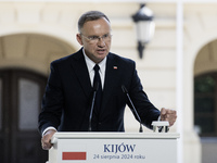 Polish President Andrzej Duda speaks during a joint press conference with Ukrainian President Volodymyr Zelenskiy and Lithuanian Prime Minis...