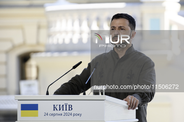 Ukrainian President Volodymyr Zelenskiy speaks during a joint press conference with Polish President Andrzej Duda and Lithuanian Prime Minis...