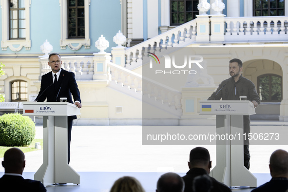 Polish President Andrzej Duda speaks during a joint press conference with Ukrainian President Volodymyr Zelenskiy and Lithuanian Prime Minis...