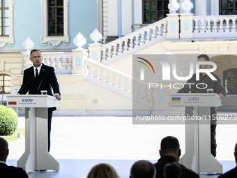 Polish President Andrzej Duda speaks during a joint press conference with Ukrainian President Volodymyr Zelenskiy and Lithuanian Prime Minis...