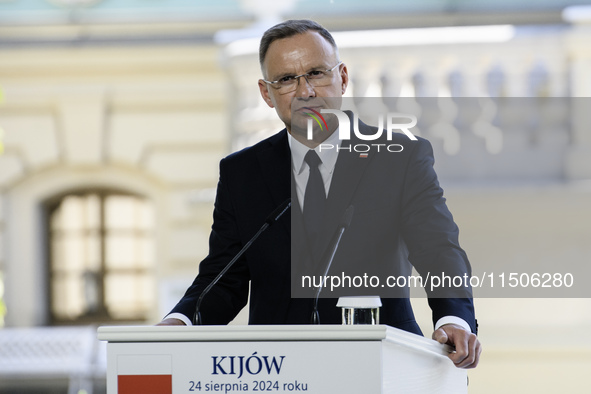 Polish President Andrzej Duda speaks during a joint press conference with Ukrainian President Volodymyr Zelenskiy and Lithuanian Prime Minis...