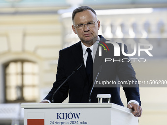 Polish President Andrzej Duda speaks during a joint press conference with Ukrainian President Volodymyr Zelenskiy and Lithuanian Prime Minis...