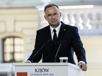 Polish President Andrzej Duda speaks during a joint press conference with Ukrainian President Volodymyr Zelenskiy and Lithuanian Prime Minis...