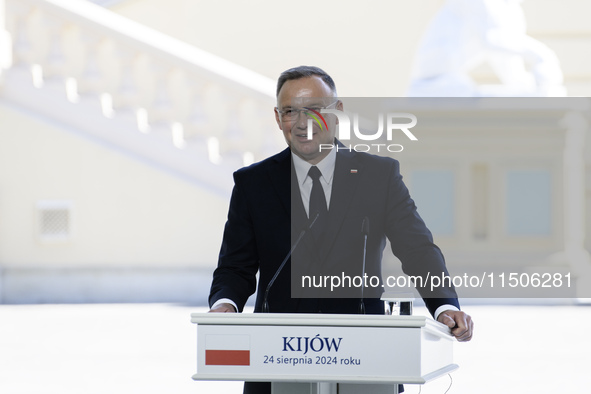 Polish President Andrzej Duda speaks during a joint press conference with Ukrainian President Volodymyr Zelenskiy and Lithuanian Prime Minis...