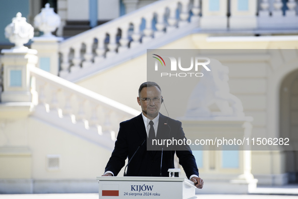 Polish President Andrzej Duda speaks during a joint press conference with Ukrainian President Volodymyr Zelenskiy and Lithuanian Prime Minis...