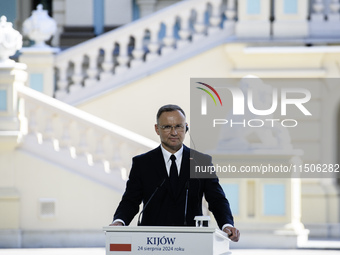 Polish President Andrzej Duda speaks during a joint press conference with Ukrainian President Volodymyr Zelenskiy and Lithuanian Prime Minis...