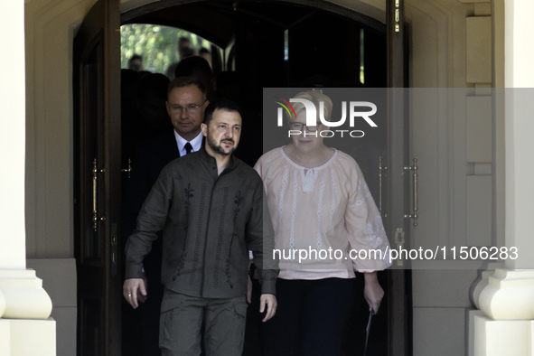 Ukraine's President Volodymyr Zelenskiy, Polish President Andrzej Duda, and Lithuanian Prime Minister Ingrida Simonyte arrive for a joint pr...