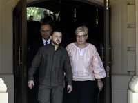 Ukraine's President Volodymyr Zelenskiy, Polish President Andrzej Duda, and Lithuanian Prime Minister Ingrida Simonyte arrive for a joint pr...