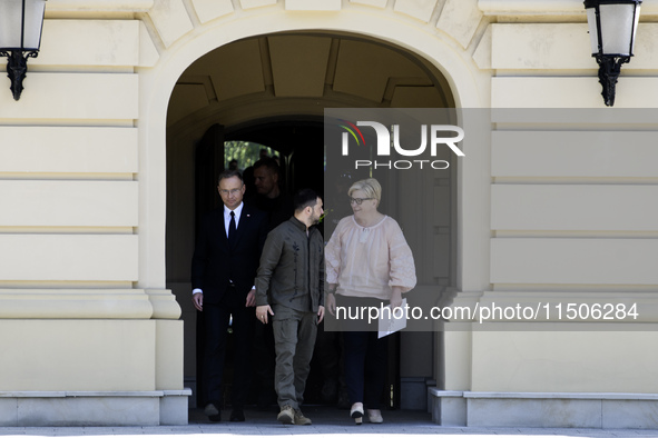 Ukraine's President Volodymyr Zelenskiy, Polish President Andrzej Duda, and Lithuanian Prime Minister Ingrida Simonyte arrive for a joint pr...