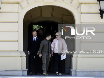 Ukraine's President Volodymyr Zelenskiy, Polish President Andrzej Duda, and Lithuanian Prime Minister Ingrida Simonyte arrive for a joint pr...