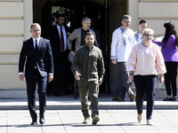 Ukraine's President Volodymyr Zelenskiy, Polish President Andrzej Duda, and Lithuanian Prime Minister Ingrida Simonyte arrive for a joint pr...