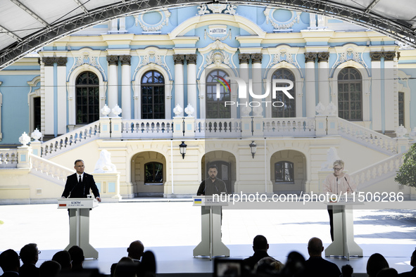 Ukraine's President Volodymyr Zelenskiy, Polish President Andrzej Duda, and Lithuanian Prime Minister Ingrida Simonyte attend a joint press...