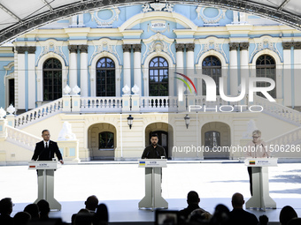 Ukraine's President Volodymyr Zelenskiy, Polish President Andrzej Duda, and Lithuanian Prime Minister Ingrida Simonyte attend a joint press...