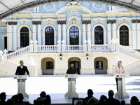 Ukraine's President Volodymyr Zelenskiy, Polish President Andrzej Duda, and Lithuanian Prime Minister Ingrida Simonyte attend a joint press...