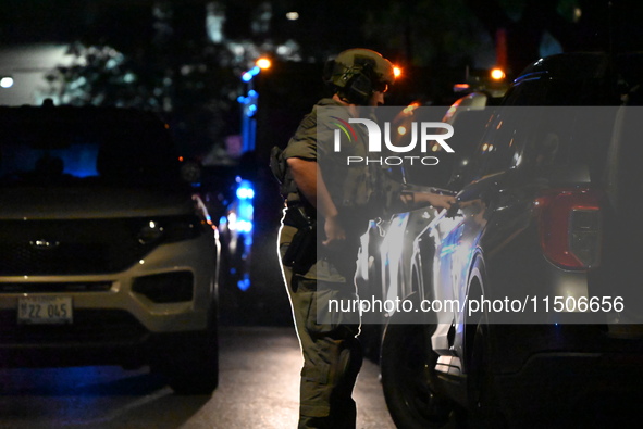 SWAT responds to a residence in Chicago, Illinois, United States, on August 23, 2024. On Friday evening, at approximately 9:15 p.m. on the 3...