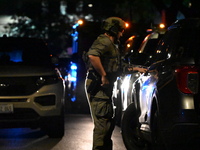 SWAT responds to a residence in Chicago, Illinois, United States, on August 23, 2024. On Friday evening, at approximately 9:15 p.m. on the 3...