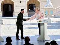 President of Ukraine Volodymyr Zelenskyy (left) shakes hands with Prime Minister of Lithuania Ingrida Simonyte during a joint news conferenc...