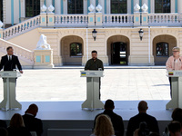 President of Poland Andrzej Duda, President of Ukraine Volodymyr Zelenskyy, and Prime Minister of Lithuania Ingrida Simonyte (L to R) hold a...