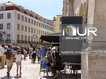 A general view of people having coffee at a Starbucks Coffee store in Lisbon, Portugal, on August 24, 2024. Brian Niccol, CEO of Starbucks s...