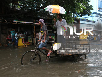 A street floods during the heavy monsoon rain in Kolkata, India, on August 24, 2024. (