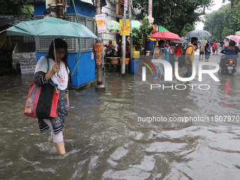 A street floods during the heavy monsoon rain in Kolkata, India, on August 24, 2024. (